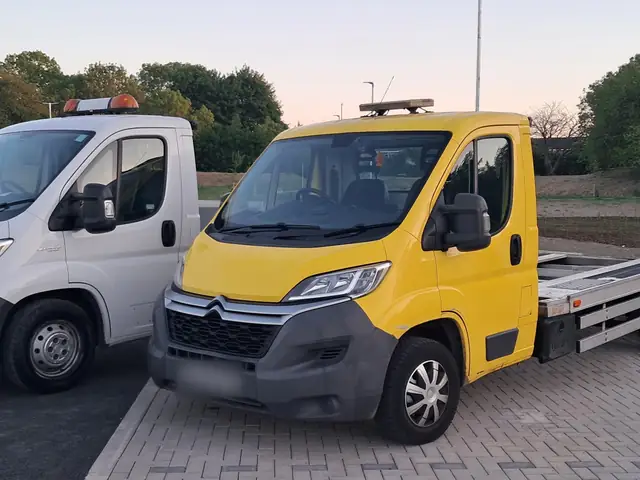Both trucks, side by side