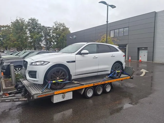 White Jaguar F-Pace on the trailer